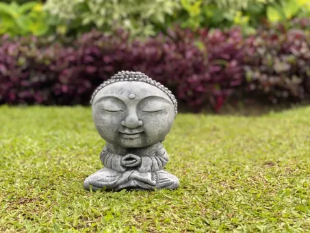 Nima - Sitting monk with big head, 30 cm H | cast stone 